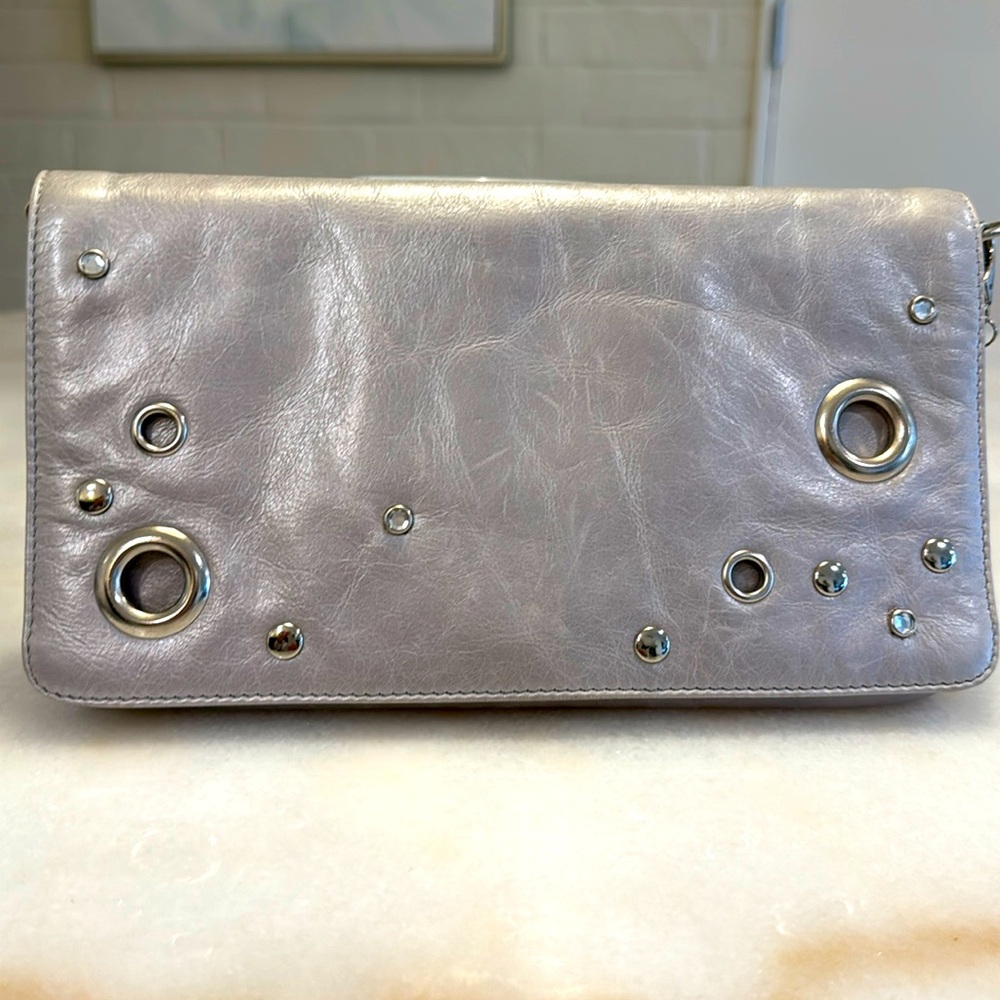 Silver leather HOBO clutch with chain.